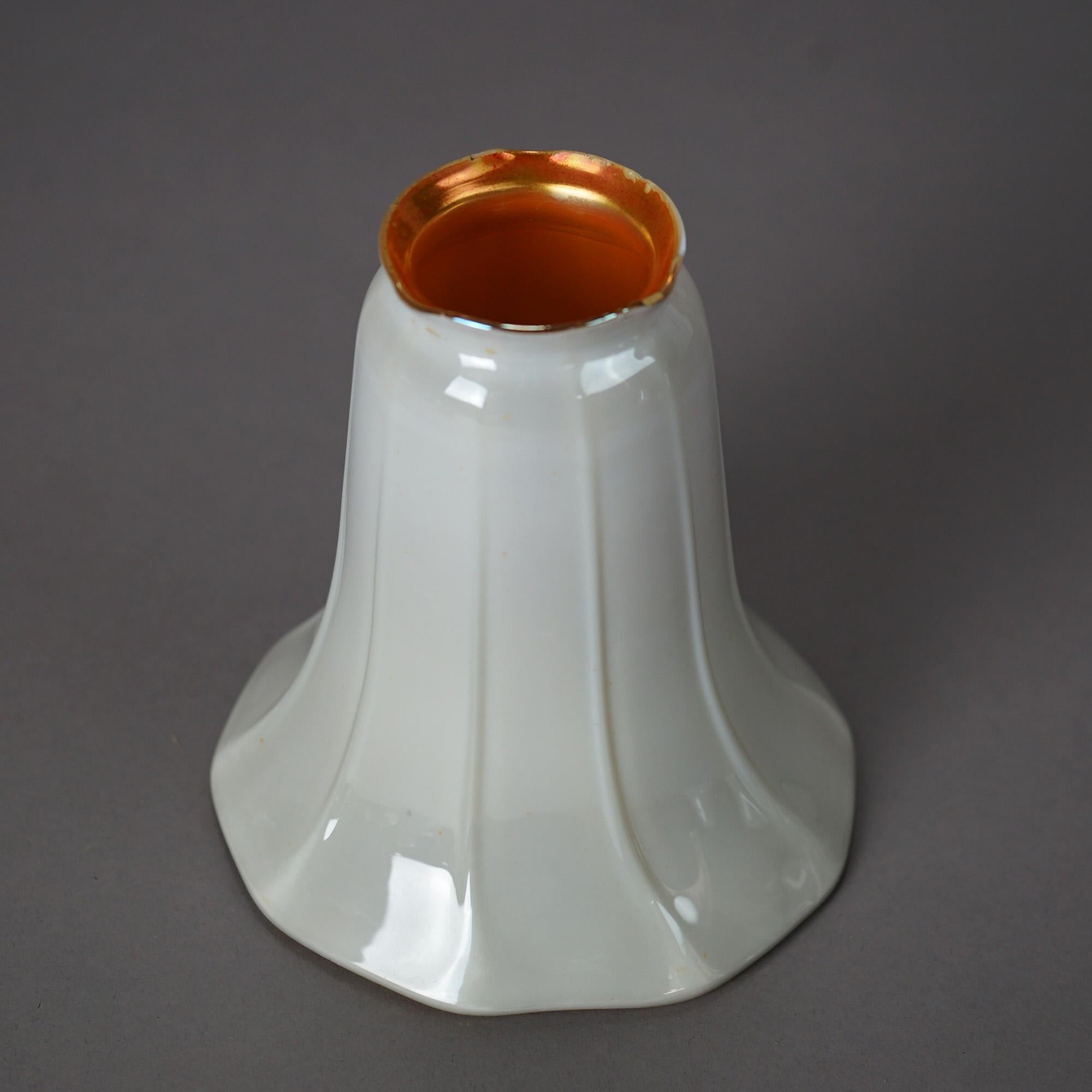 An antique set of four Arts and Crafts light shades by Steuben offer Calcite art glass construction in tulip form, c1920

Measures - 5.5
