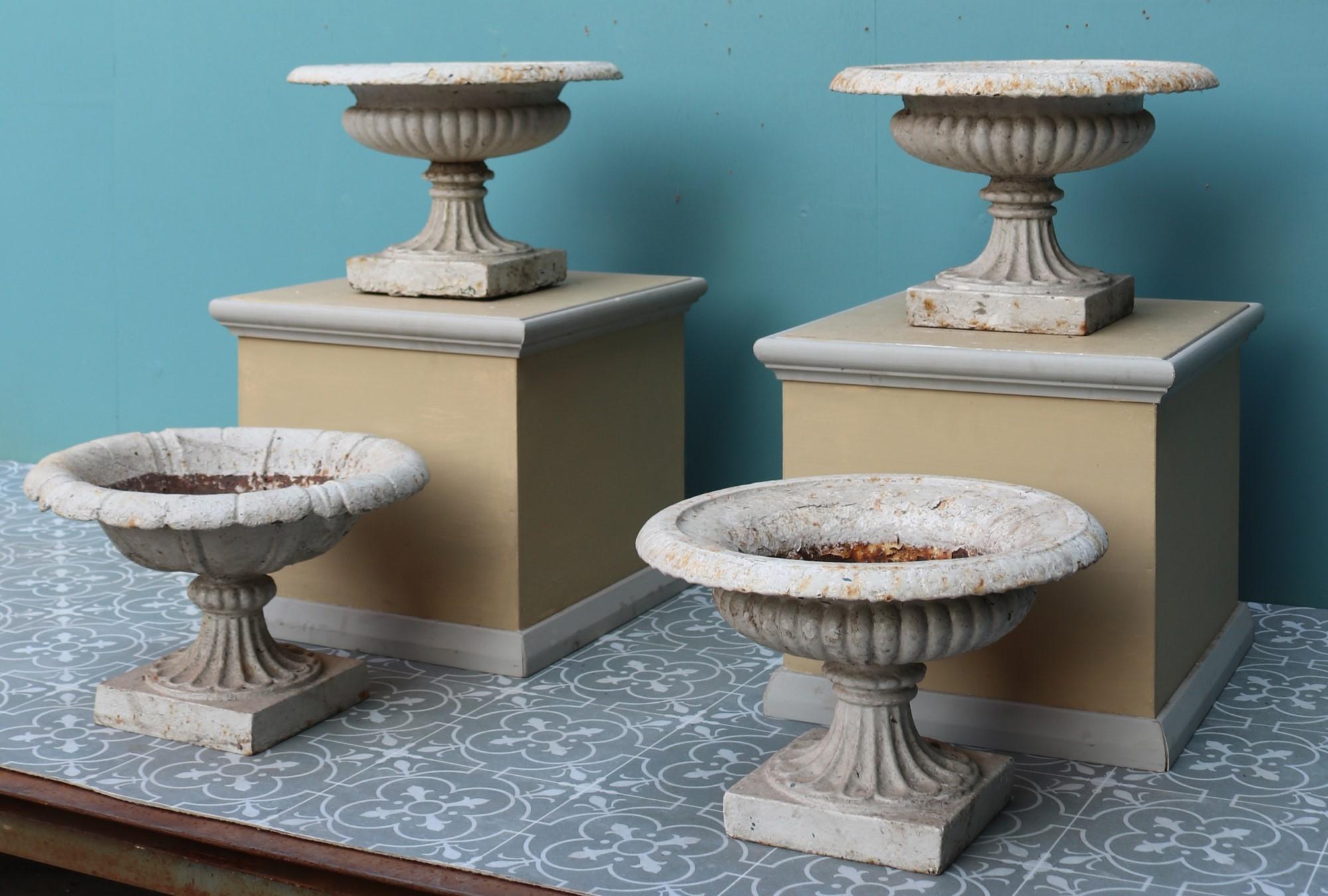 A set of shallow Victorian tazza urns. Three are identical and one slightly different at the top.

Additional Dimensions:

Bases 19 x 19 cm