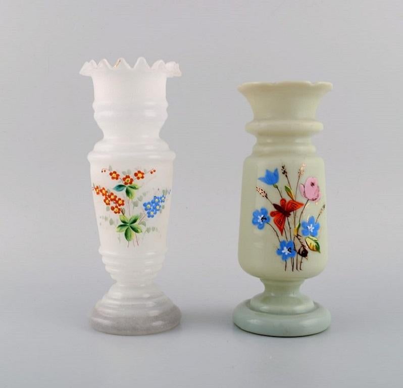 Four antique vases in hand-painted mouth-blown opal art glass. Approx. 1900.
Largest measures: 25.5 x 12.5 cm.
In excellent condition.