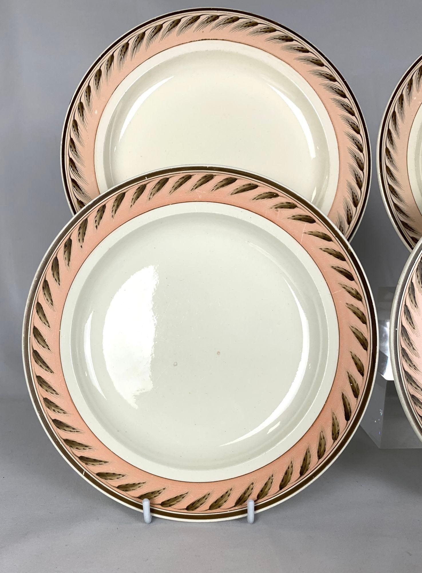Made in England in the early 19th century, circa 1815, these Wedgwood dessert or salad dishes are a beautiful and sophisticated set.
The creamware body, peach-colored border, and 18th-century Wedgwood 