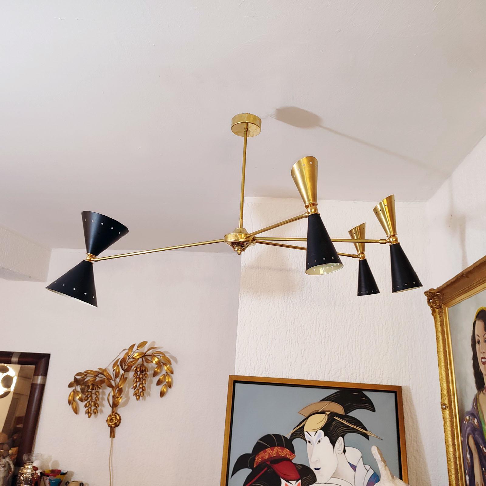 Lacquered Four-Arm Brass Asymmetrical Chandelier in the Style of Stilnovo For Sale