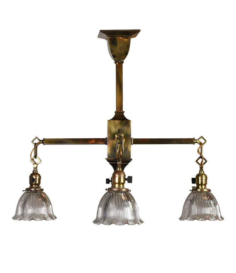 Four Arm Brass Mission Chandelier with Holophane Shades at 1stDibs