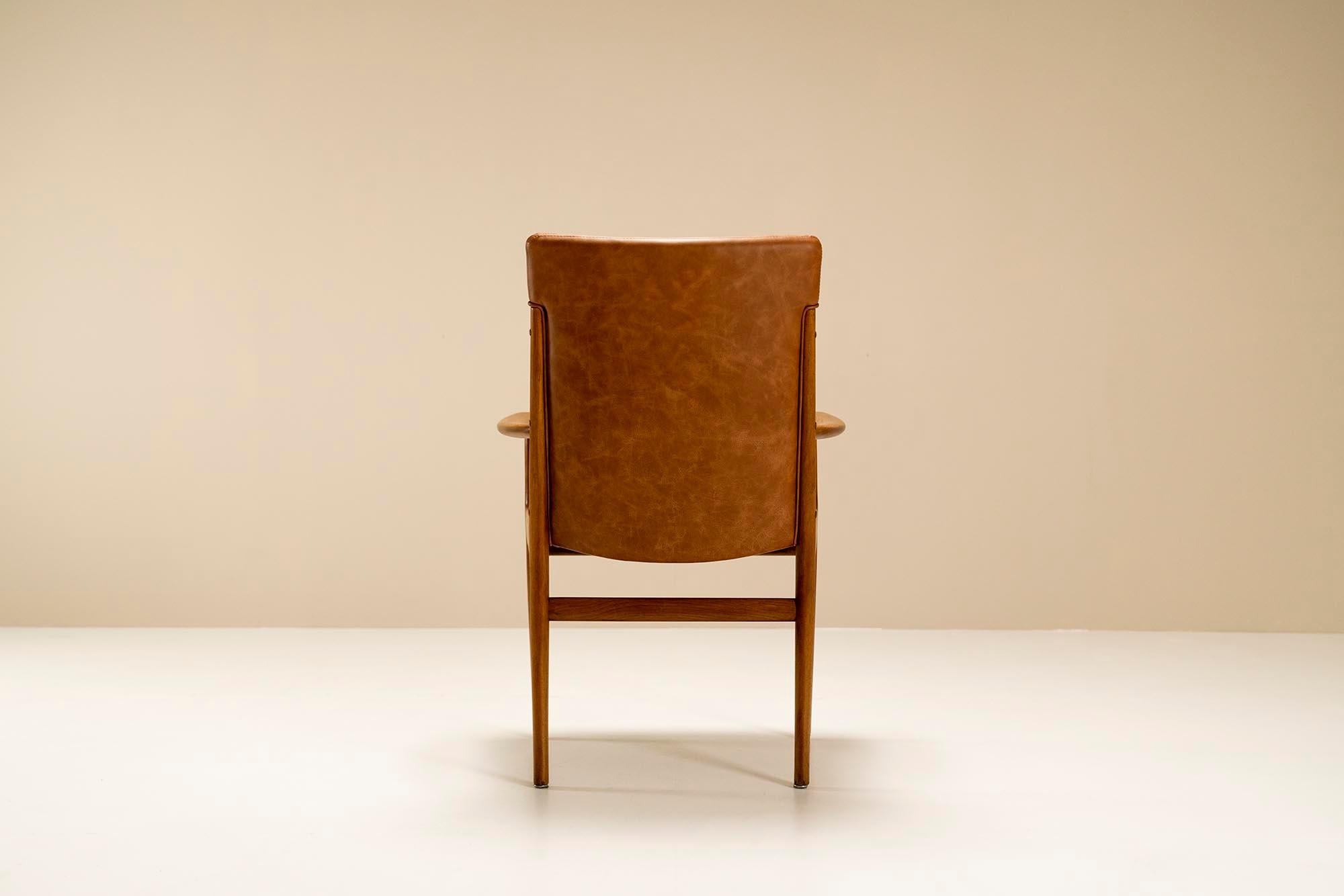 Mid-20th Century Four Armchairs in Ash Wood and Leather by Kai Lyngfeldt Larsen, Denmark, 1960s