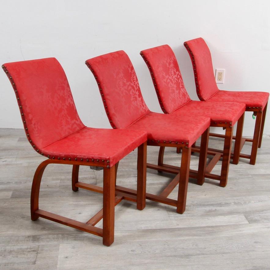 A set of four walnut modernist chairs designed by furniture and industrial designer Gilbert Rohde for Heywood Wakefield in the late 30s. They cam out of the original purchasers home and I believe that the vinyl covering (in great shape) is original.