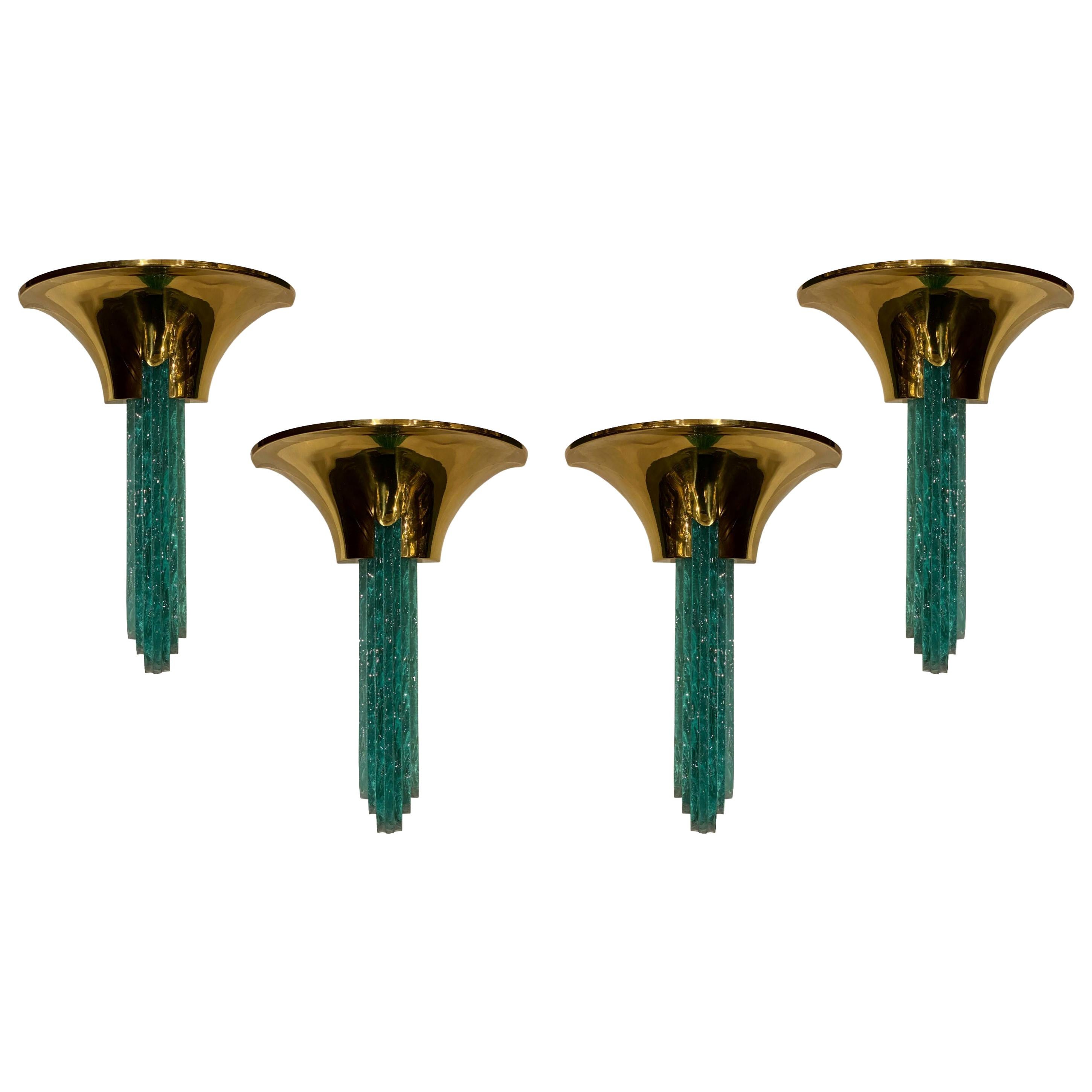 Four  mid century  polished  Brass and Glass Sconces Attributed to Karl Springer