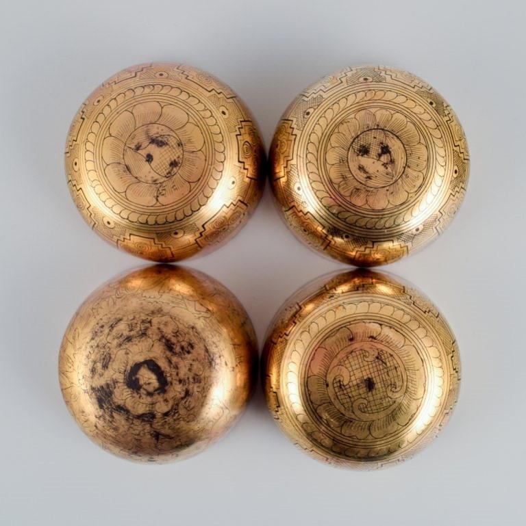 Four Asian bowls made of papier-mâché. Decorated in gold and black. For Sale 2