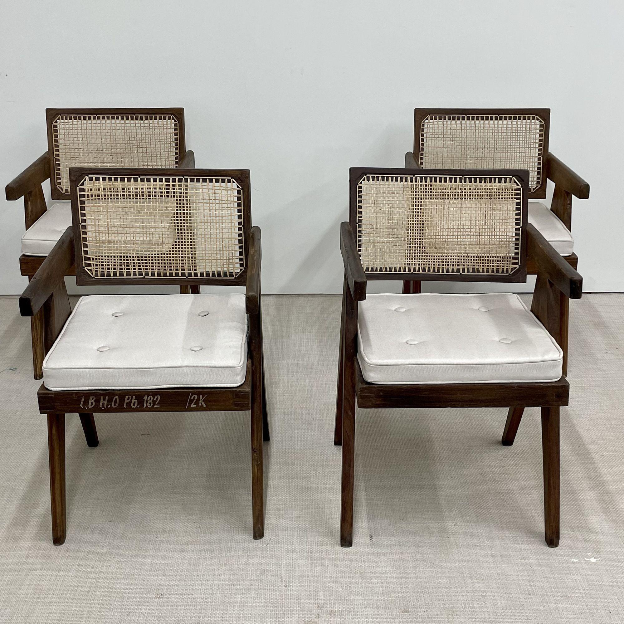 Four (4) authentic Pierre Jeanneret floating back arm chairs, Mid-Century Modern
 
Each with markings indicating provenance - These are authentic and directly from Chandigarh, India. These chairs have been lightly washed and polished. The wear to