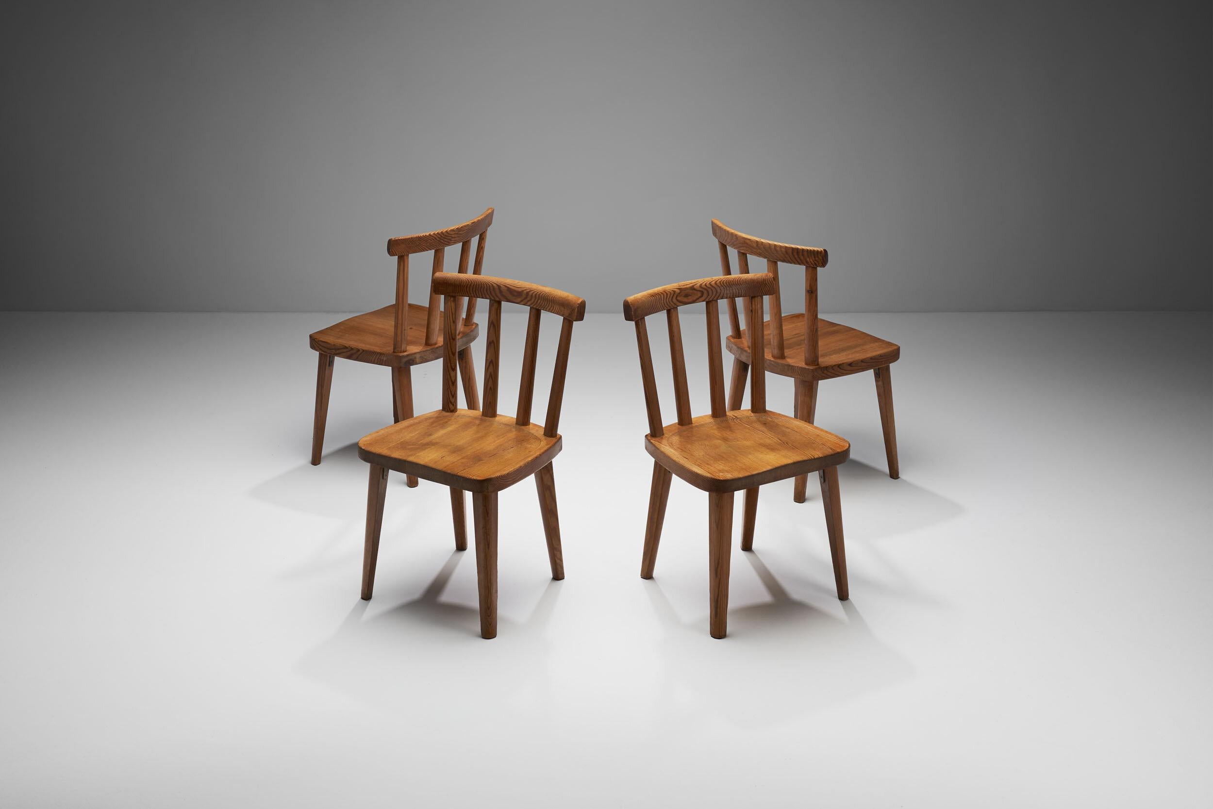 Four Axel Einar Hjorth Utö chairs, Sweden, 1930s

The ‘Utö’ chairs from Axel Hjorth Sportstugemöble furniture line consists of a simple composition made of pine that mixes the aesthetics of rural handicraft with international modernism. Produced by