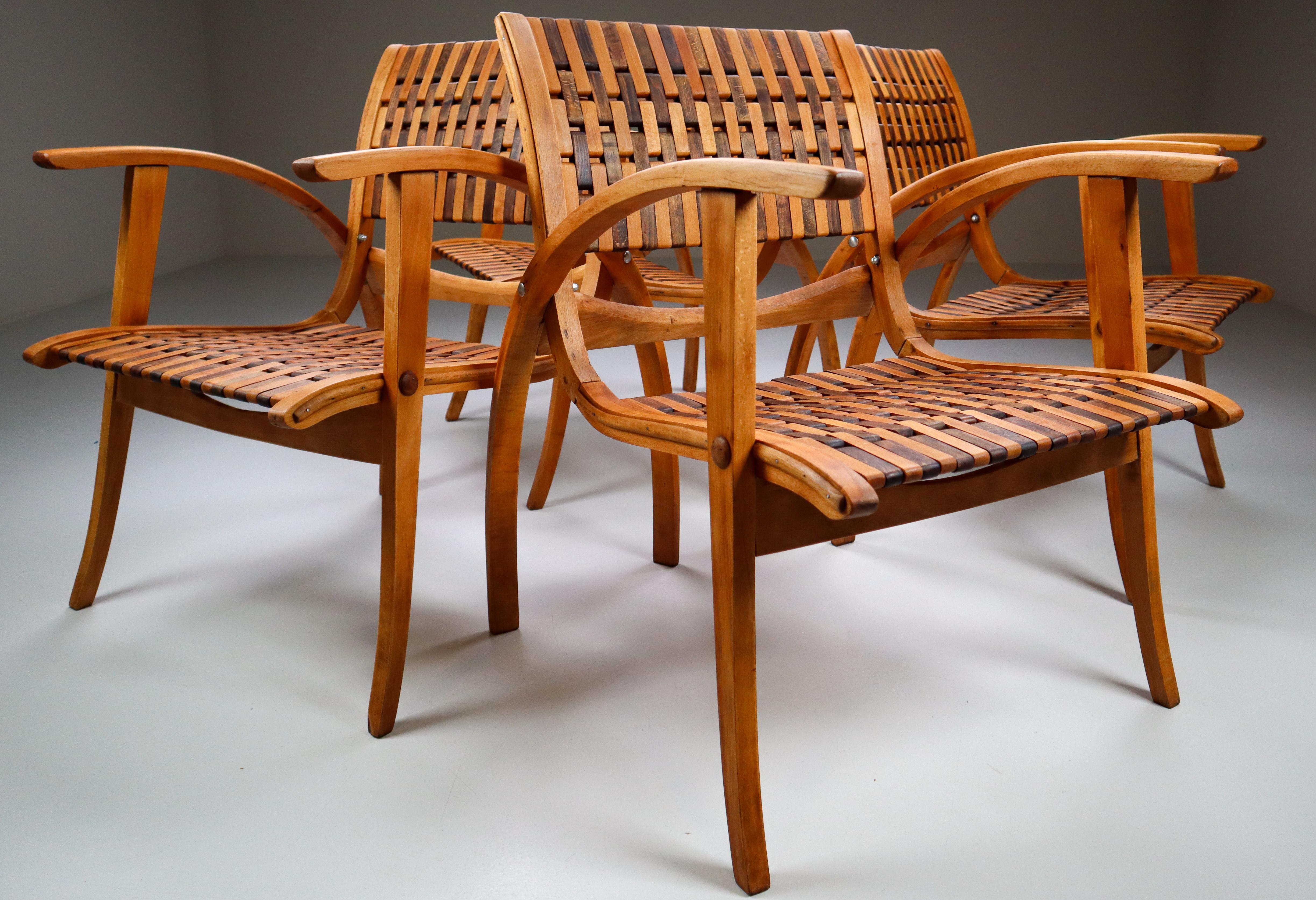 Four Bauhaus bentwood armchairs by Erich Dieckmann, Germany, 1930s

This German set is executed with bentwood and webbed seat and back designed by Erich Dieckmann and created in the 1930s. The design features the Bauhaus philosophy, in which form