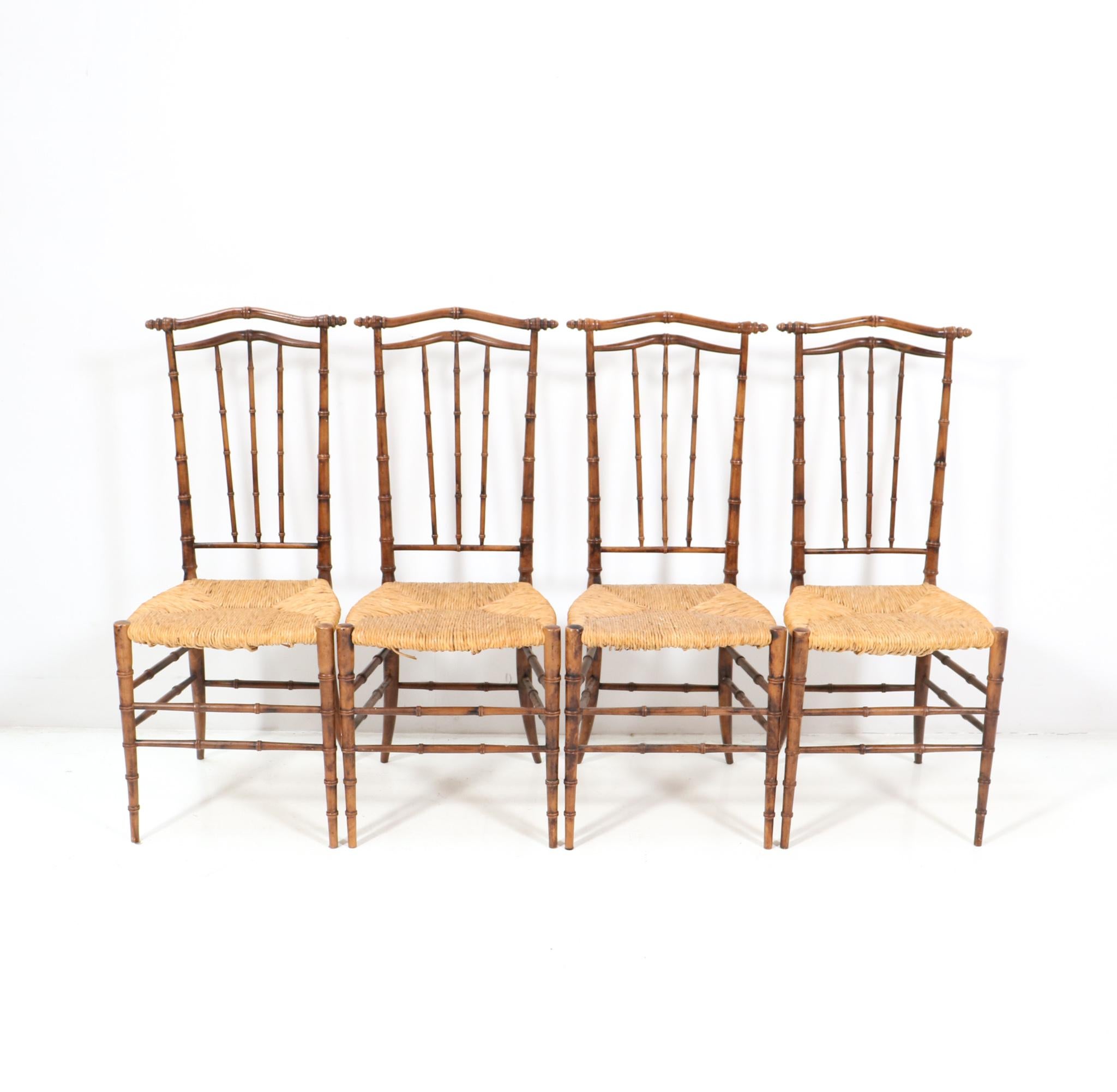 Magnificent and rare set of four Mid-Century Modern dining room chairs.
Striking Dutch design from the 1970s.
Solid stained beech faux bamboo frames with original rush seats.
This wonderful set of four Mid-Century Modern high back dining room chairs