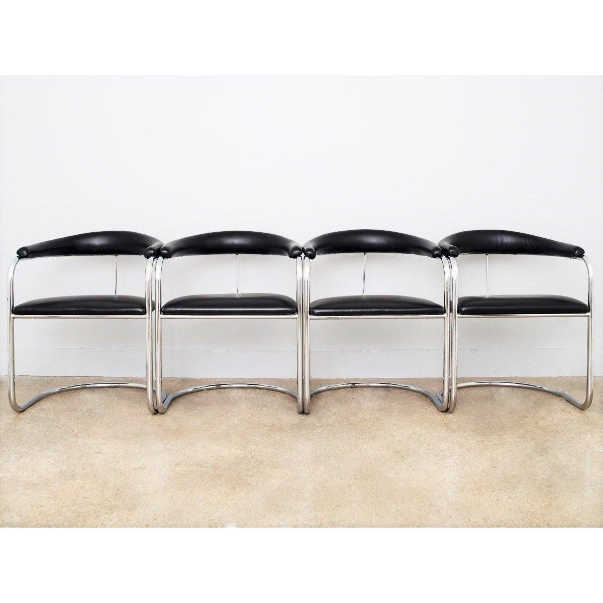 The Hungarian designer Anton Lorenz is famous for his timeless steel tube furniture. The original cantilevered chrome base and professionally upholstered in black.