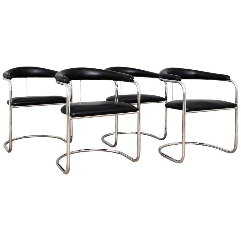 Four Black and Chrome Dining Chairs by Anton Lorenz for Thonet