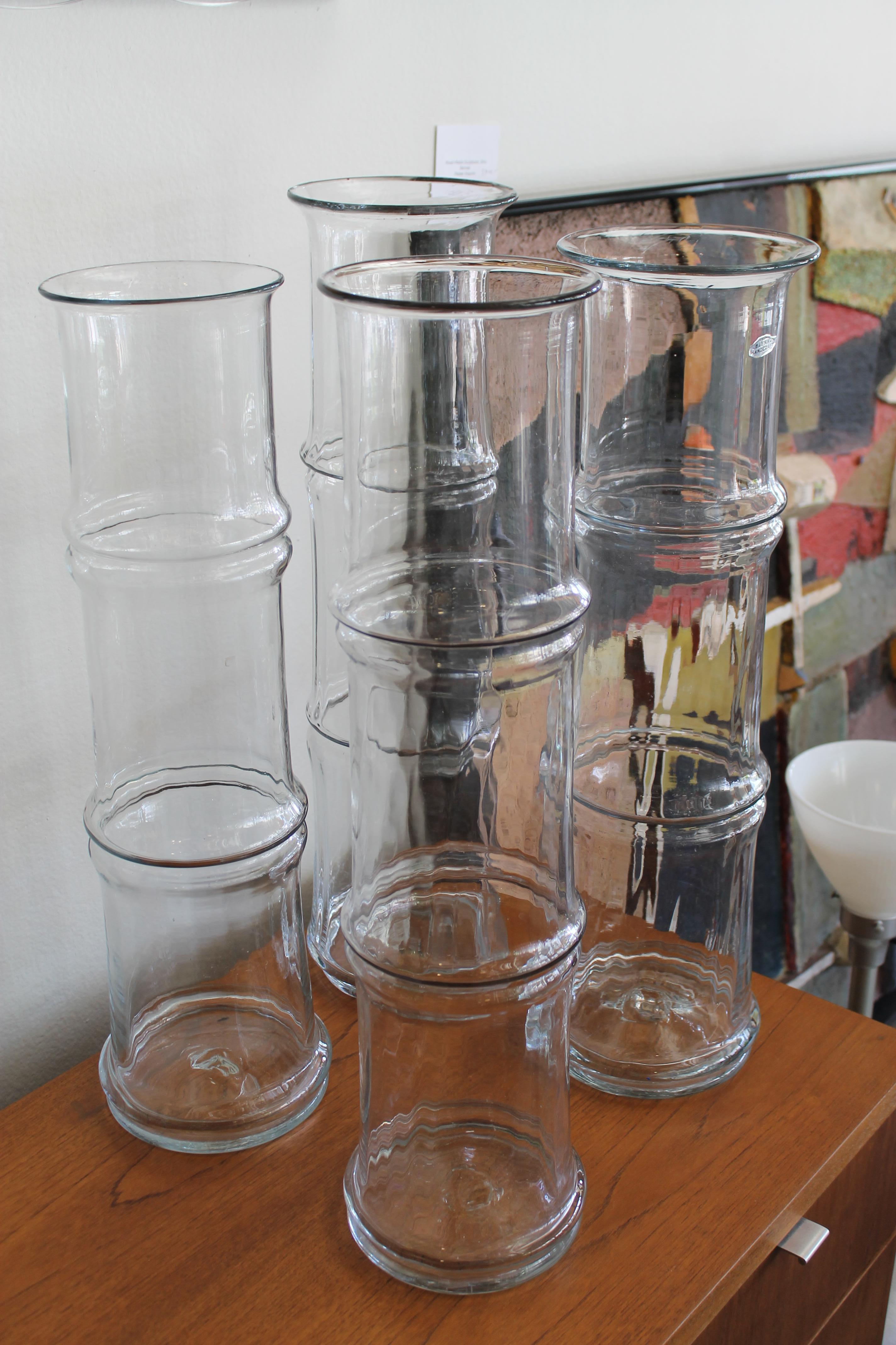 One vase has a silver label that says Blenko Handcraft. Vases measure between 24