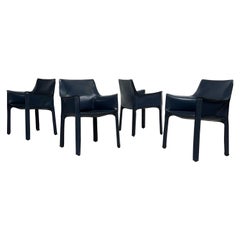 Four Blue Leather Cab Arm Chairs by Mario Bellini