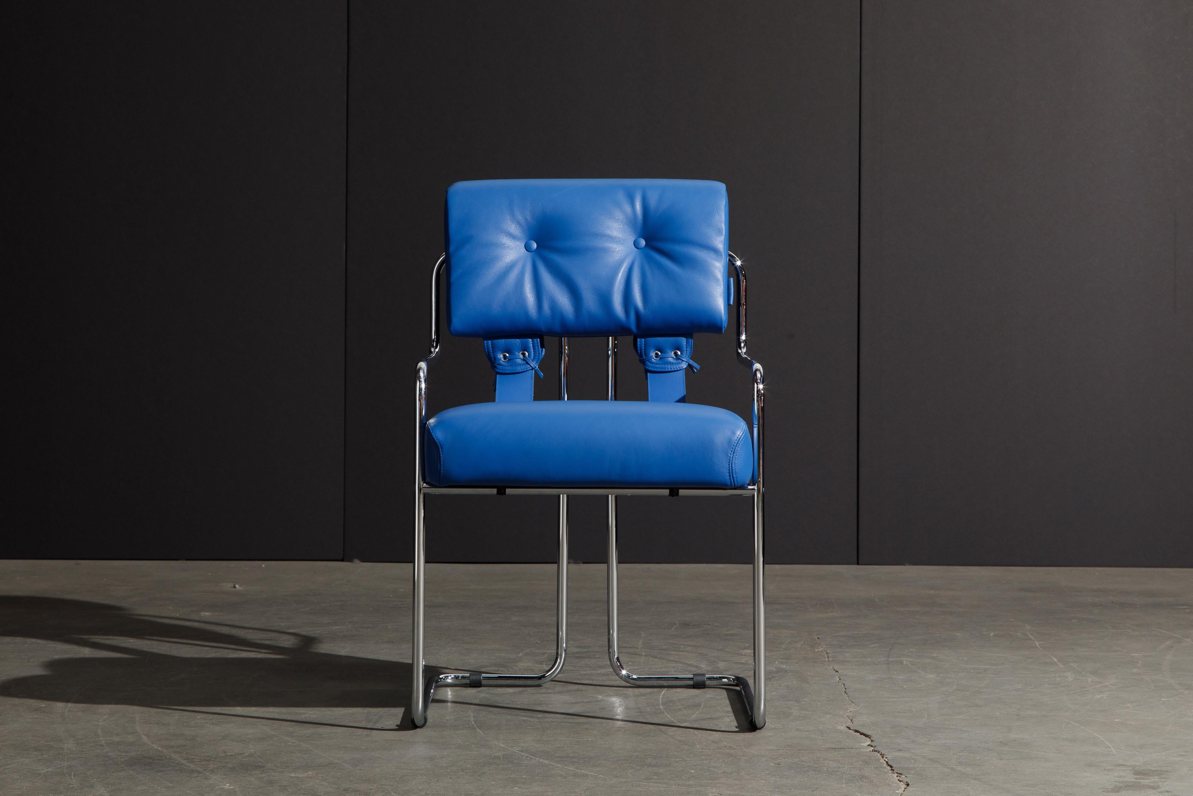 Currently, the most coveted dining chairs by interior designers are 'Tucroma' chairs by Guido Faleschini for i4 Mariani, and we have this incredible set of four (4) Tucroma armchairs in a vibrant electric blue leather with polished chrome frames.