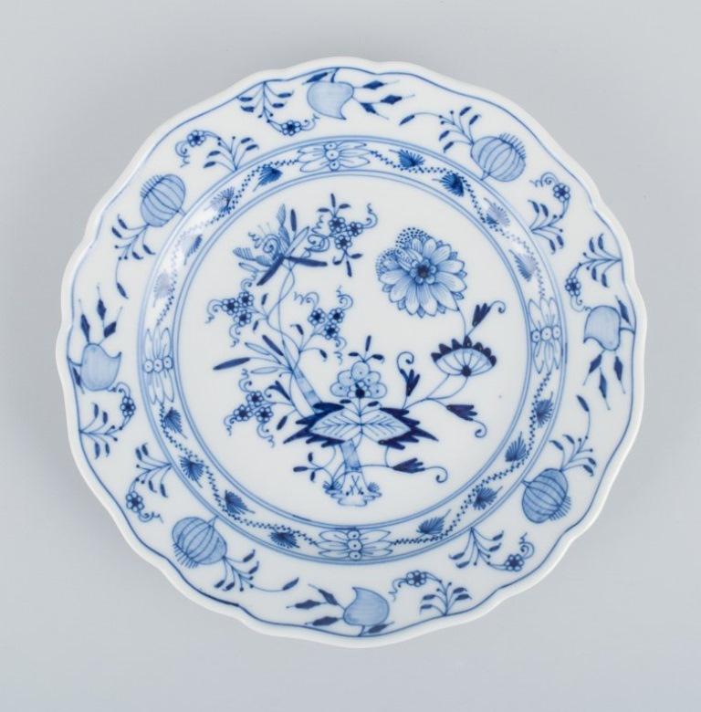 Meissen, Germany, four Blue Onion pattern plates.
Hand-painted.
Approx. 1900.
Marked.
In perfect condition.
Third factory quality.
Dimensions: D 17.4 cm.



