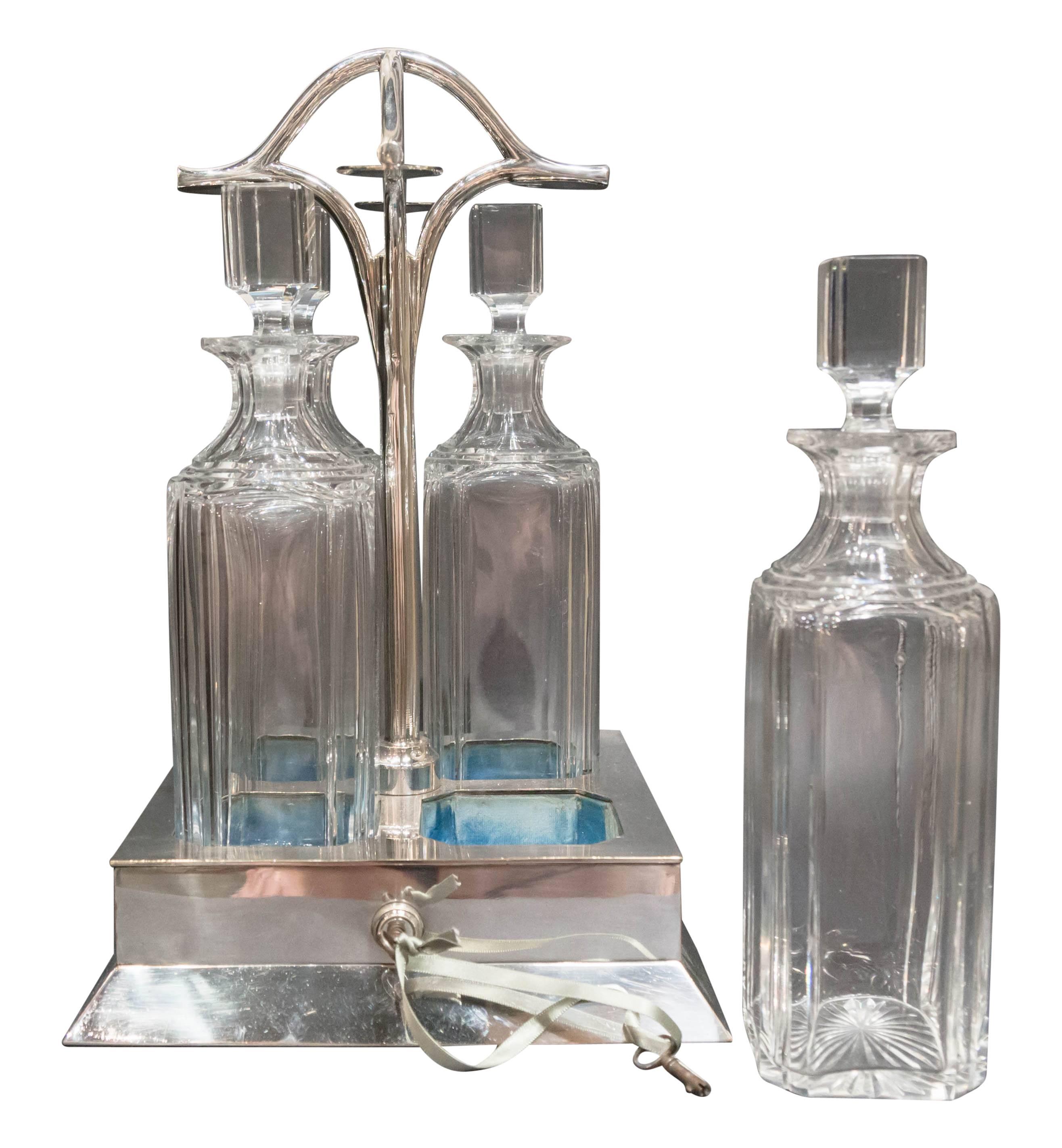 Four Bottle Locking Tanalus with Silver Plate, circa 1890 In Excellent Condition In Aspen, CO