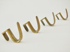 Four Brass Coat Hooks by Carl Auböck