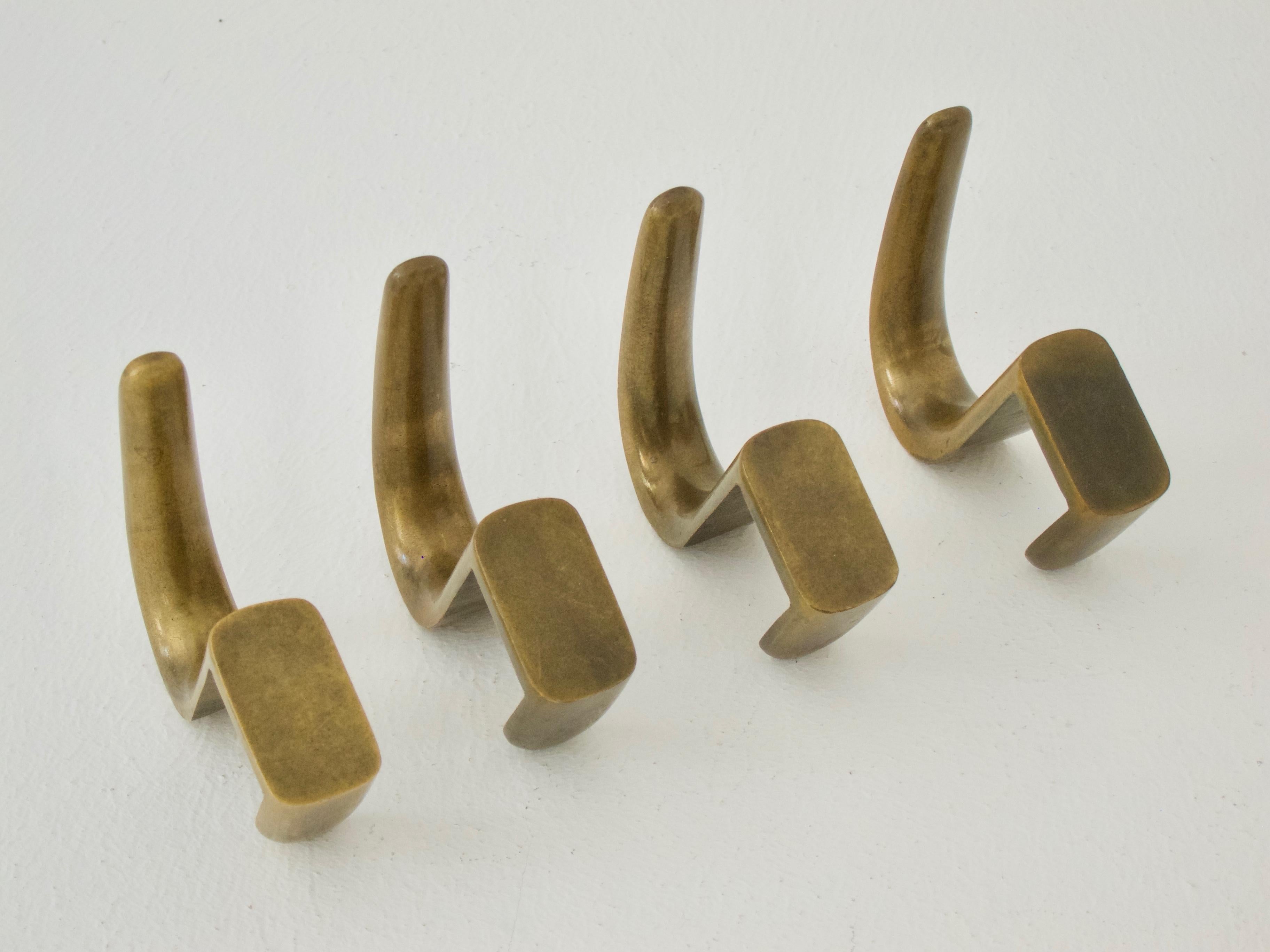 Mid-20th Century Four Brass Coat Hooks by Carl Auböck For Sale