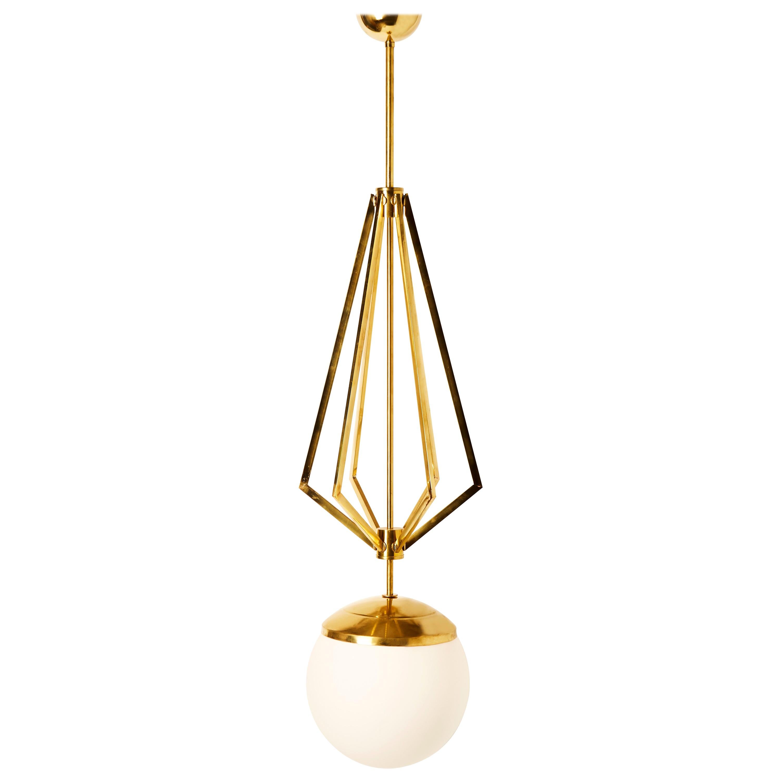 Four Brass Geometrical Suspension with a Large White Glass Globe For Sale