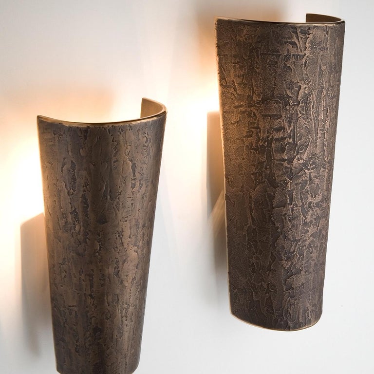 Four wall lamps Toscana Model by Quasar. Cast bronze. With original label.