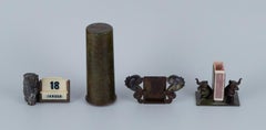 Four Bronzes: a Piggy Bank, Calendar, Matchbox Holder and a Place Card Holder