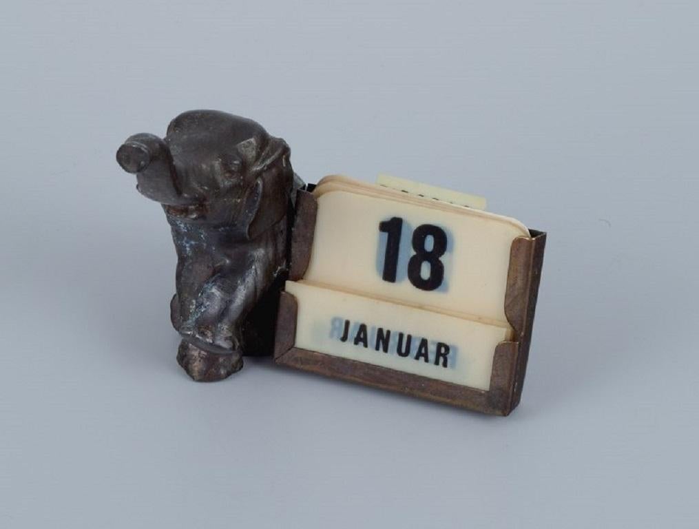 Art Deco Four Bronzes: a Piggy Bank, Calendar, Matchbox Holder and a Place Card Holder For Sale