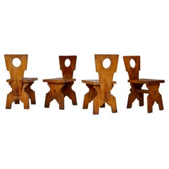 Four Brutalist Chunky Oak Dining Chairs With Circle Back Cut Out