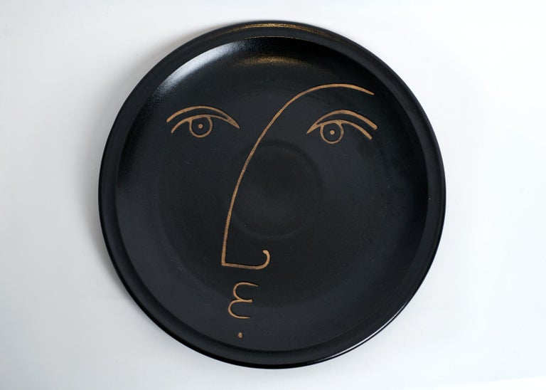 Contemporary Four Ceramic Decorative Plates with Faces Signed by Dalo