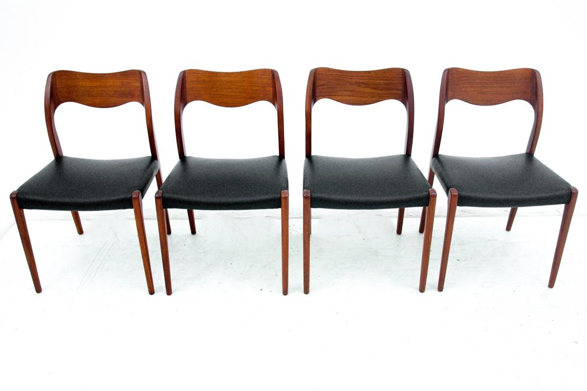 Beautiful dining chairs made of teak wood, upholstered with new high quality Italian leather in black color. Produced in the 1960s in Denmark. Unique design by Niels Otto Møller. Excellent condition. Ideal choice for classic danish design lovers who