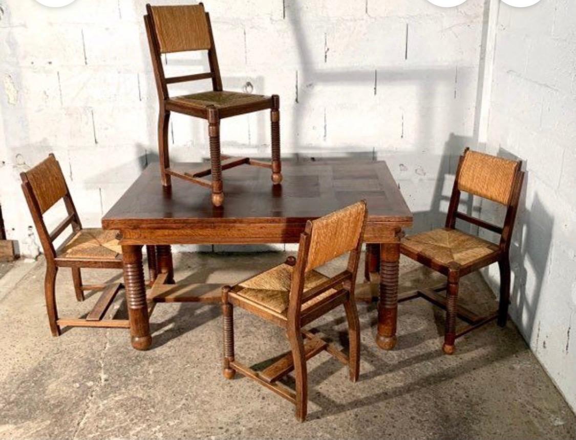 French Four Chairs Oak and Straw by Charles Dudouyt