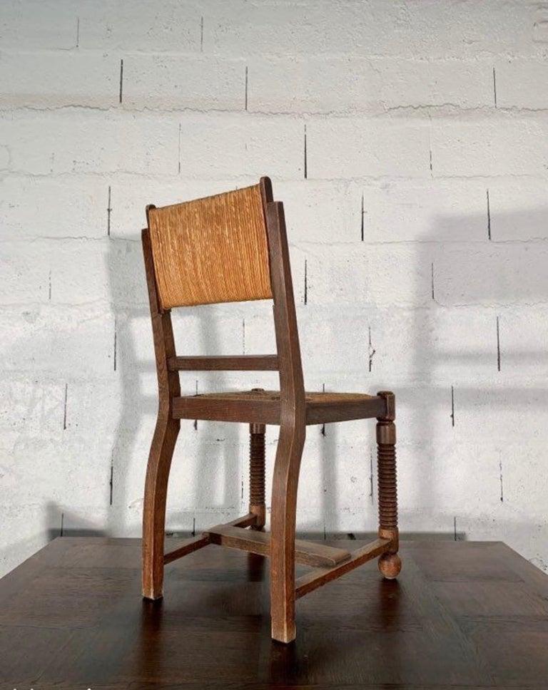 French Four Chairs Oak and Straw by Charles Dudouyt