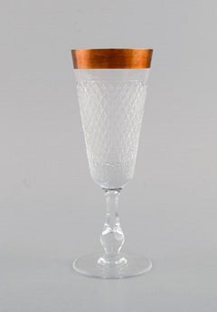 Four Champagne Glasses in Mouth-Blown Crystal Glass with Gold Edge, France 1930s