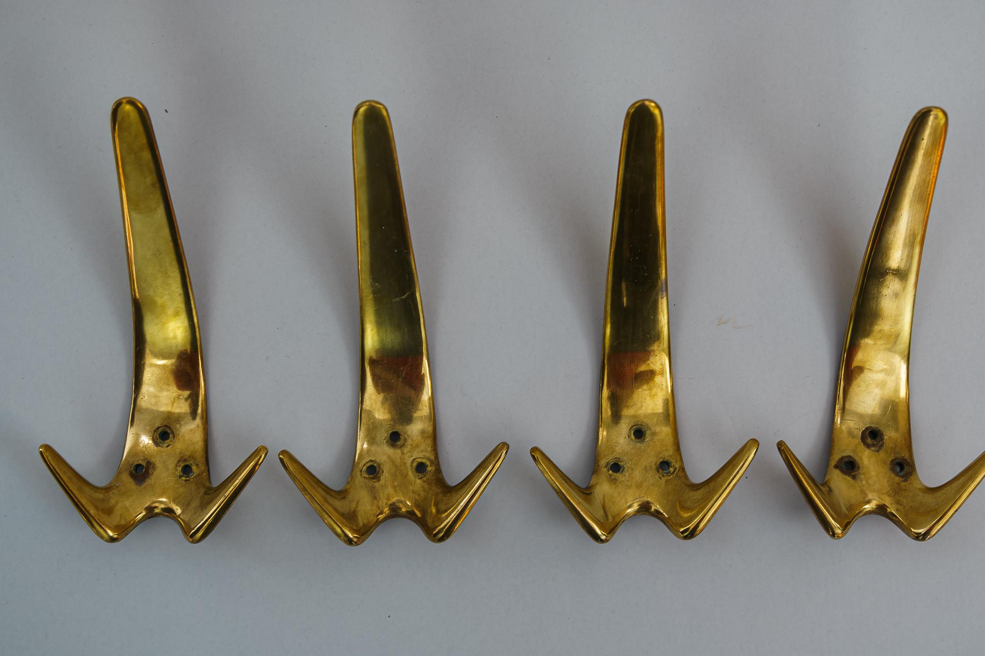 Four charming Auböck wall hooks, circa 1950s
Original condition
Price is for all together.