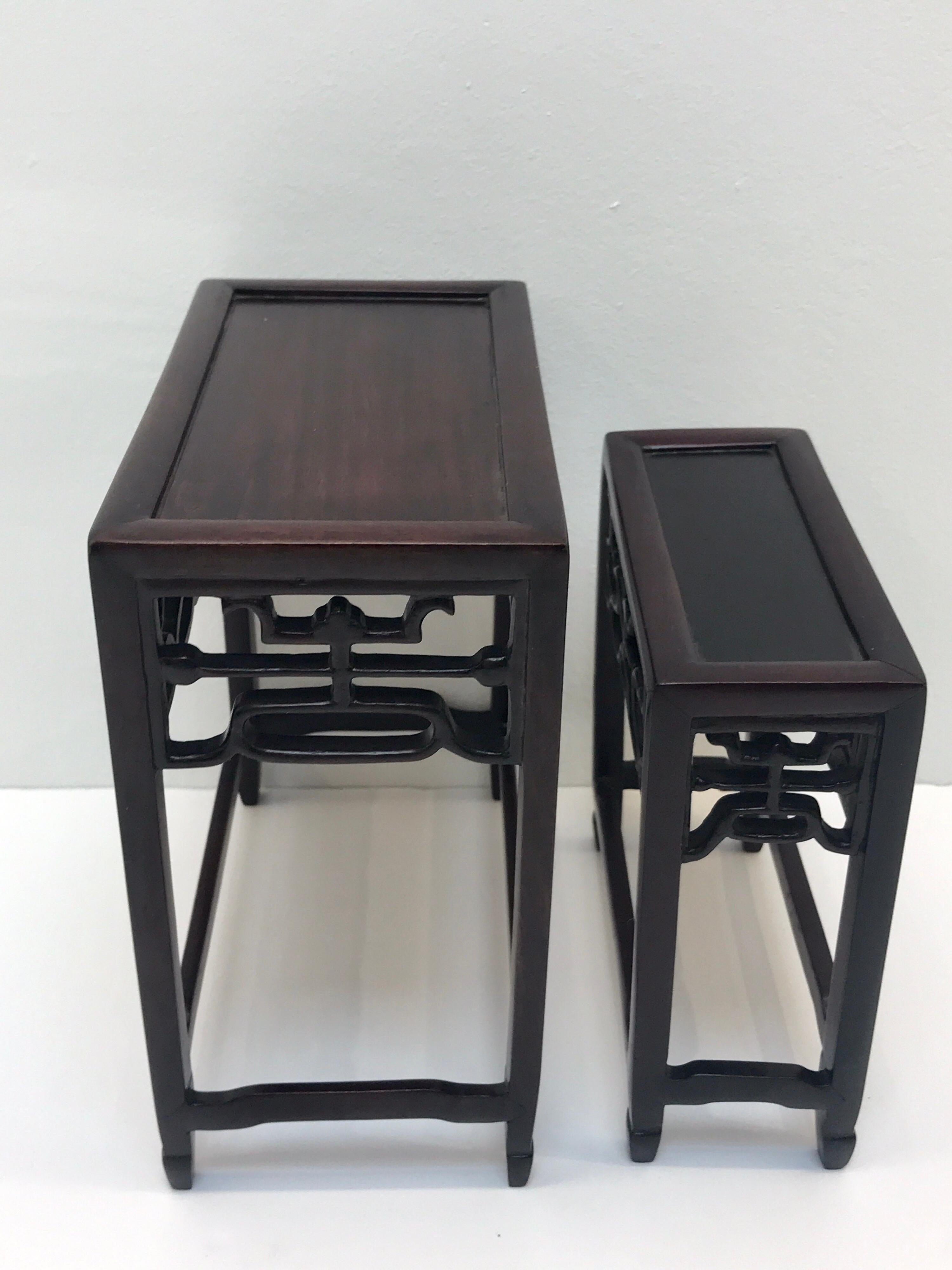 20th Century Four Chinese Graduating Carved Hardwood Stands