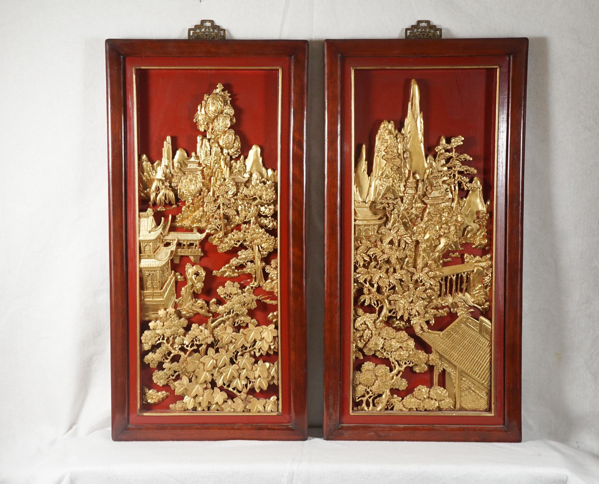 These elaborate and deeply carved panels are mid-20th century. The carving is very detailed and on a rather deep heavy wooden panel. All the raised areas are richly detailed and gilded while the background is lacquered a bright Chinese red. This is