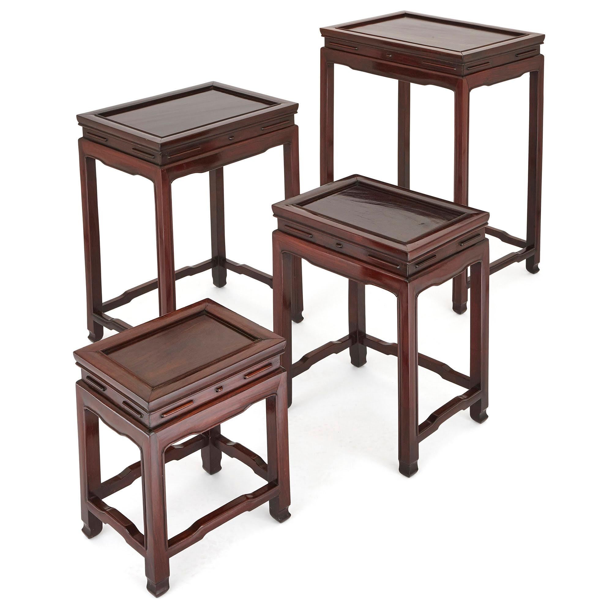 These beautiful tables were created in China in the early 20th century. They have been carved from rosewood. These ‘nested tables’ vary in their size, so they can be easily stacked. These table sets are designed to be used occasionally, for tea