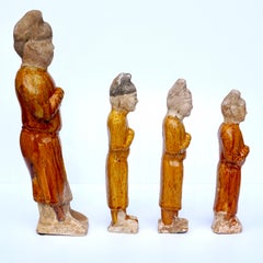 Four Chinese Tang Dynasty Glazed Pottery Court Attendants