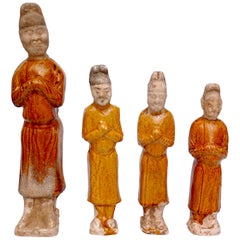 Four Chinese Tang Dynasty Glazed Pottery Court Attendants