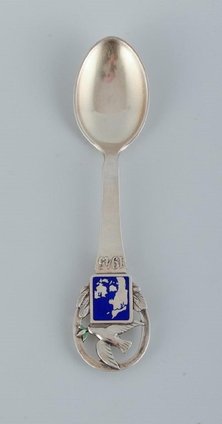 Sterling Silver Four Christmas Spoons from 1941, 1945, 1947, 1949. Grann and Laglye, Copenhagen For Sale