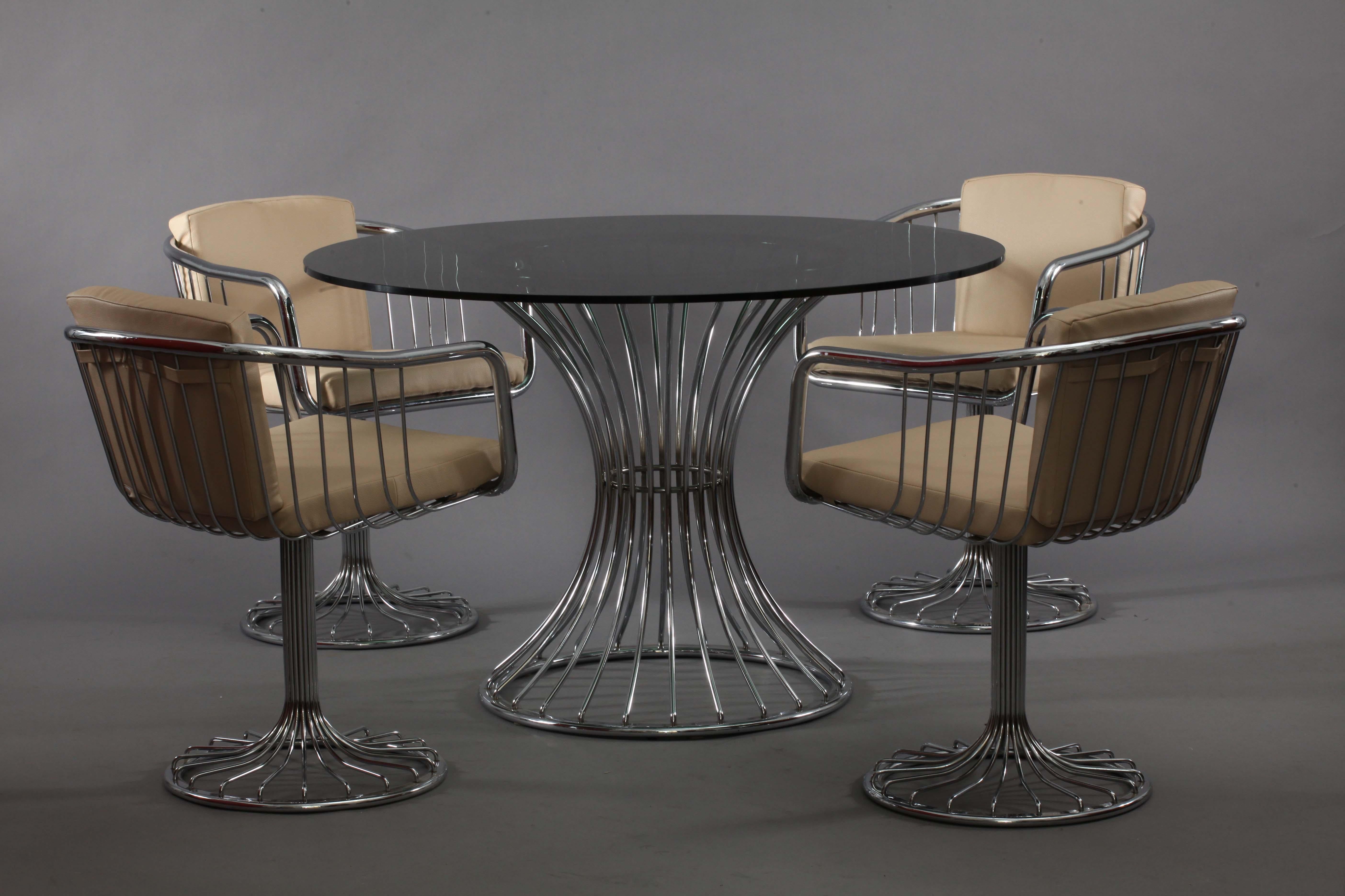 Late 20th Century Four Chrome Armchairs and Table with Smoke Glassplate Rinaldi Gastone Italy 1970