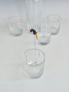 Four  classic whiskey rocks glasses with matching decanter