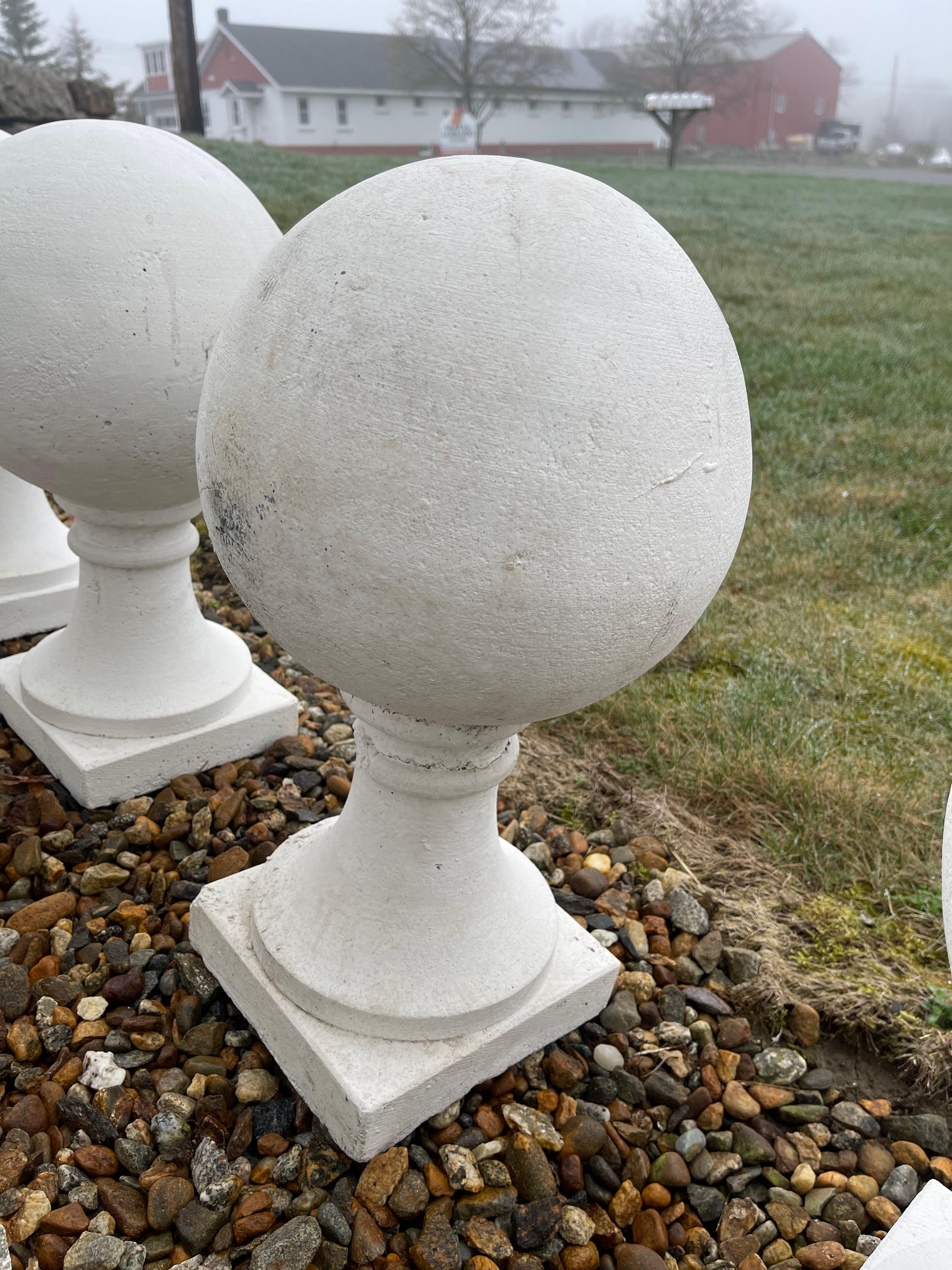 Molded Four Classic White Cement Ball Finials on Square Base from a North Shore Estate