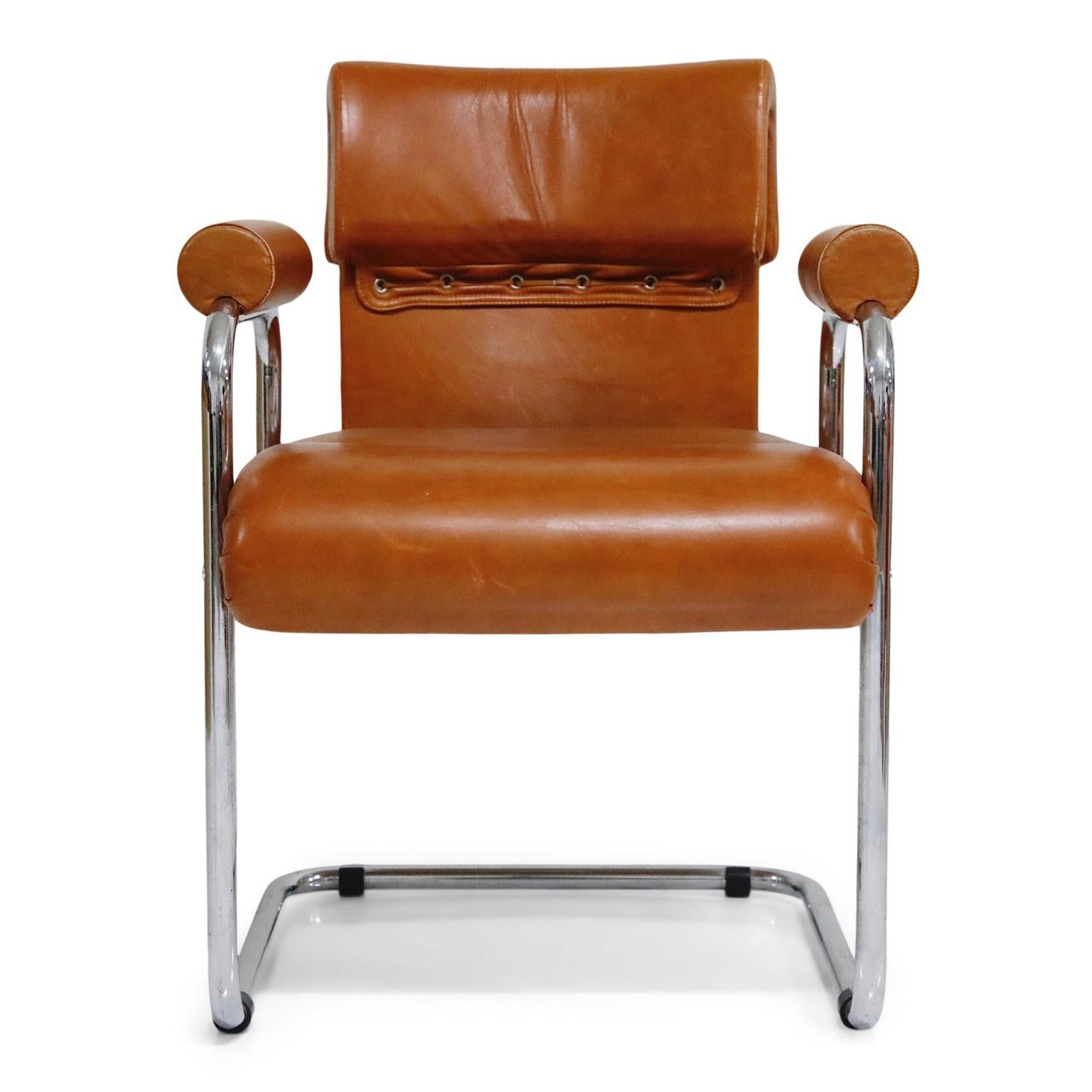 An incredible set of four (4) chairs by Guido Faleschini for i4Mariani, under The Pace collection and retailed by Hermes. The seats and backs retain the original supple cognac colored leather upholstery and are attached to graceful chromed steel