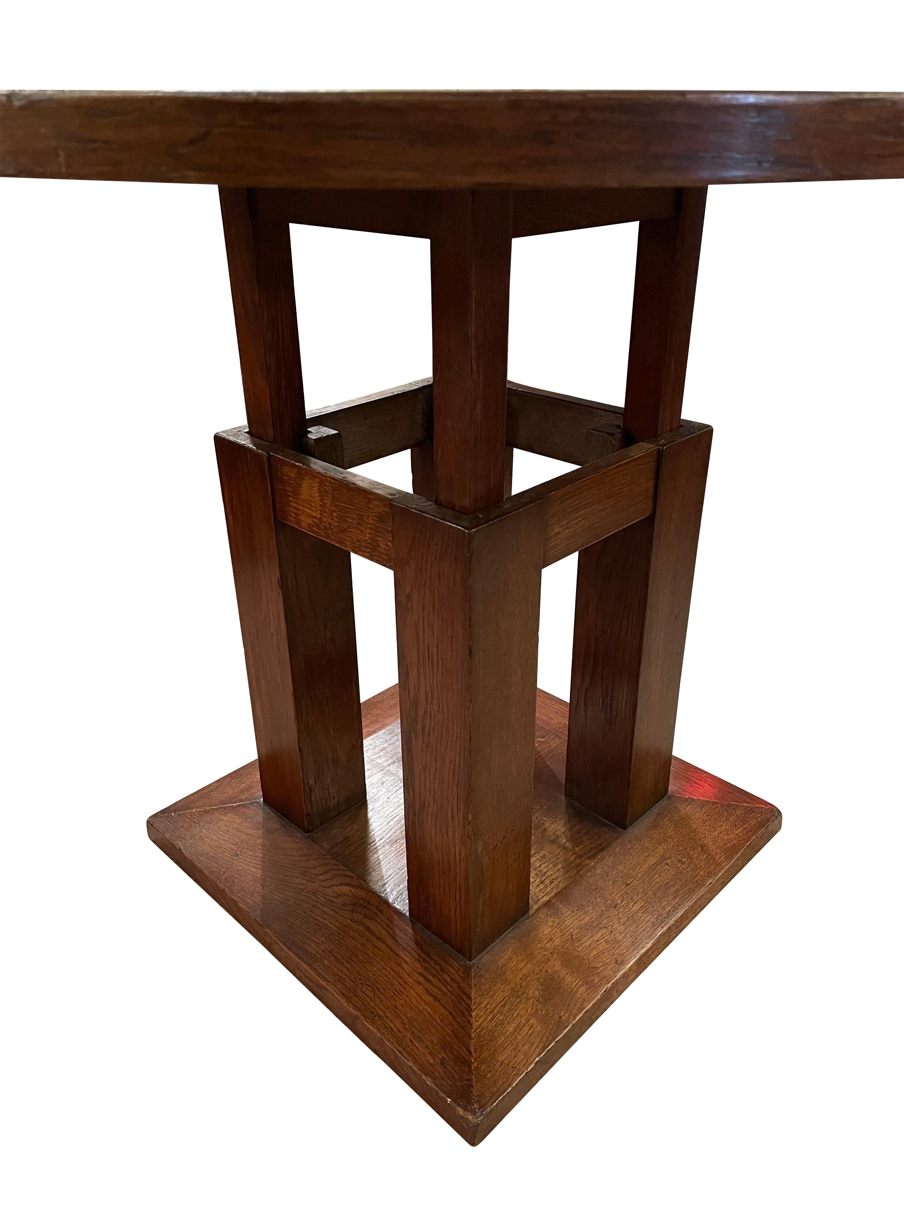 Mid century French oak round top side table with four square column base.
Decorative mitered designed top.
Stepped square base.
Recently refinished.
Arriving April.