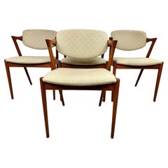 Four Customizable Kai Kristiansen Teak Dining Chairs in Excellent Condition