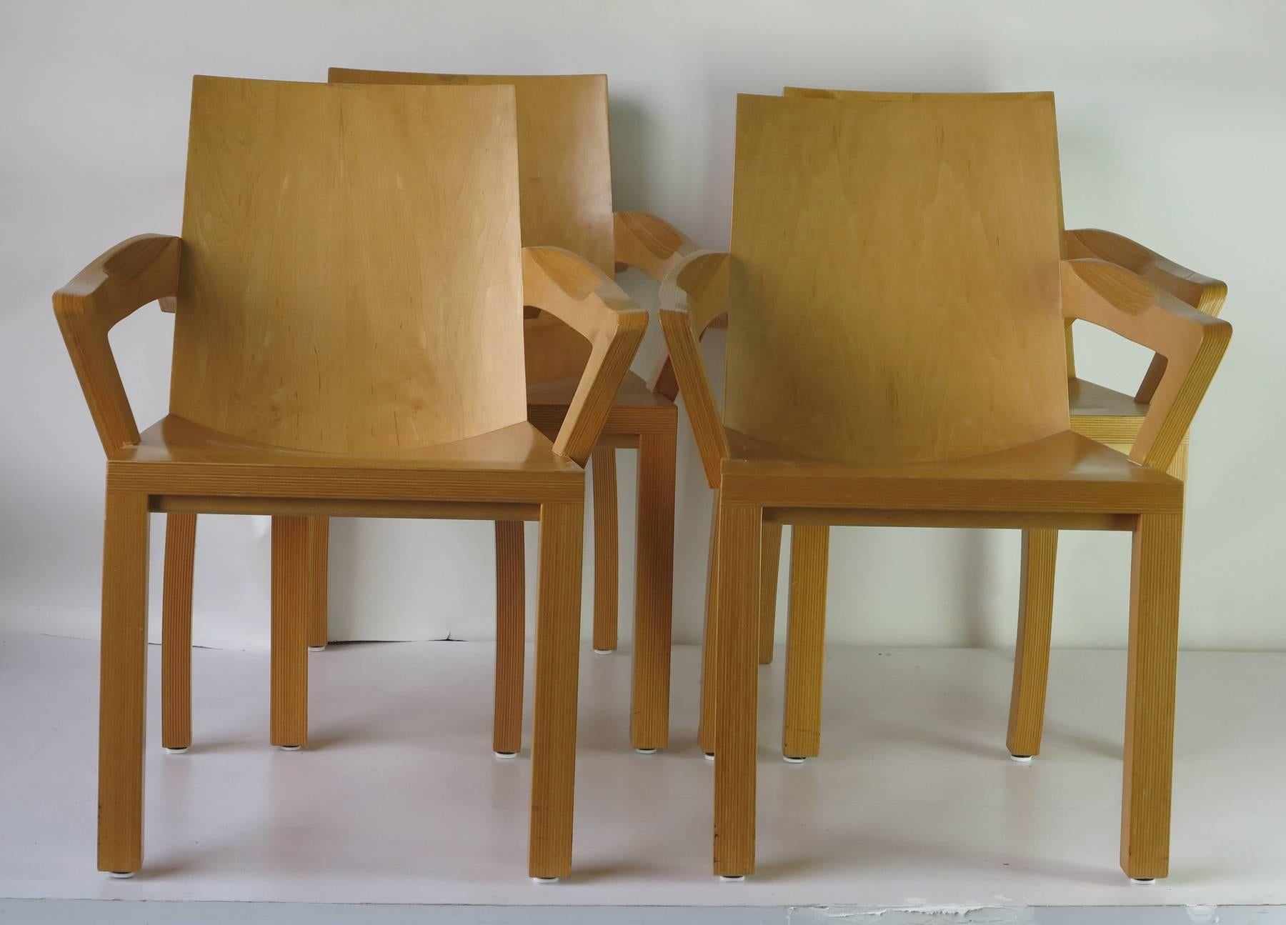 Four Dakota Jackson Arm Chairs. Dining room type chairs very comfortable seats. Beautifully constructed with laminated maple.  