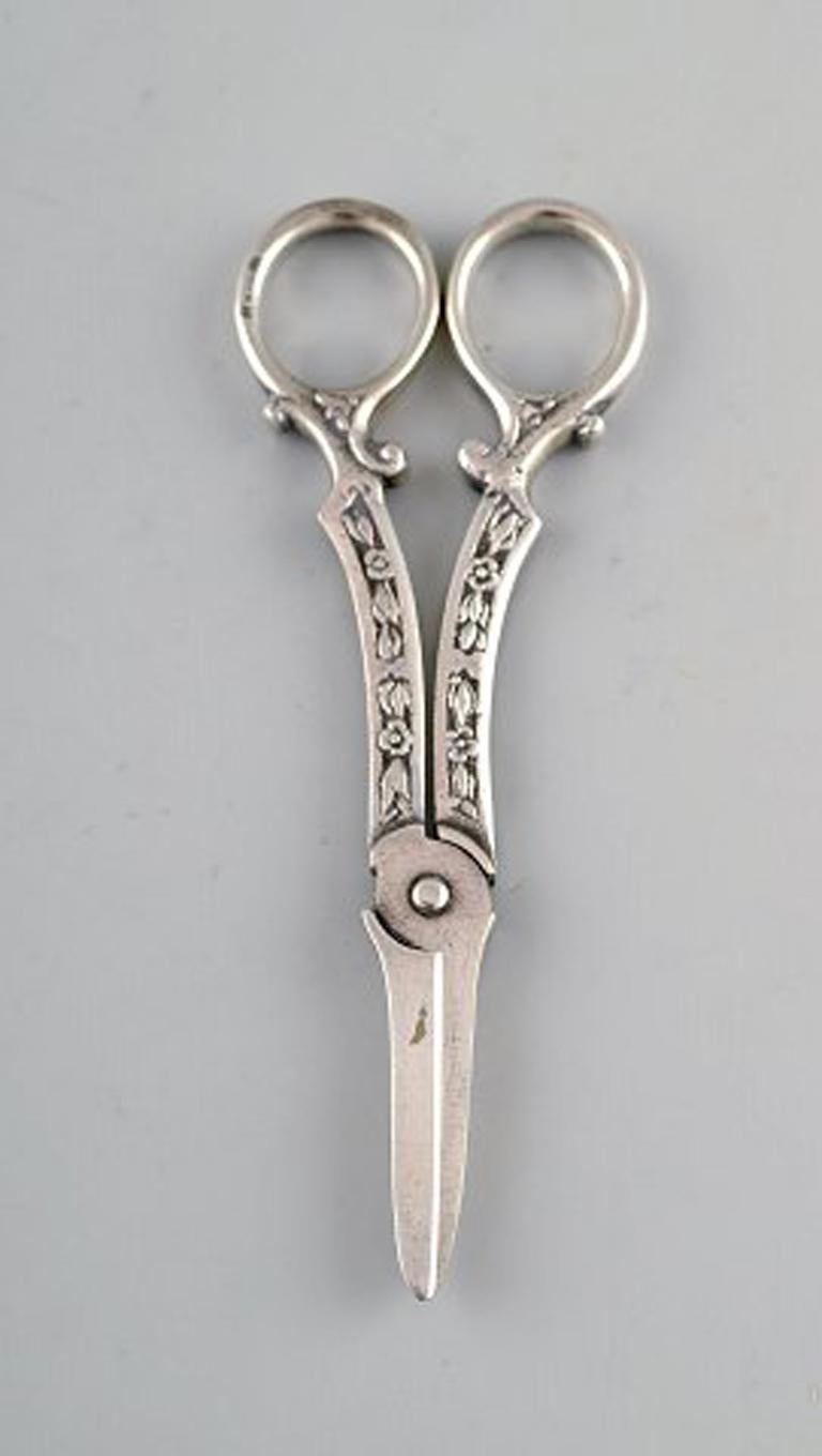 Art Nouveau Four Danish and European scissors and tongs in silver, Grann & Laglye 830s.  For Sale