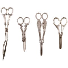 Vintage Four Danish and European scissors and tongs in silver, Grann & Laglye 830s.