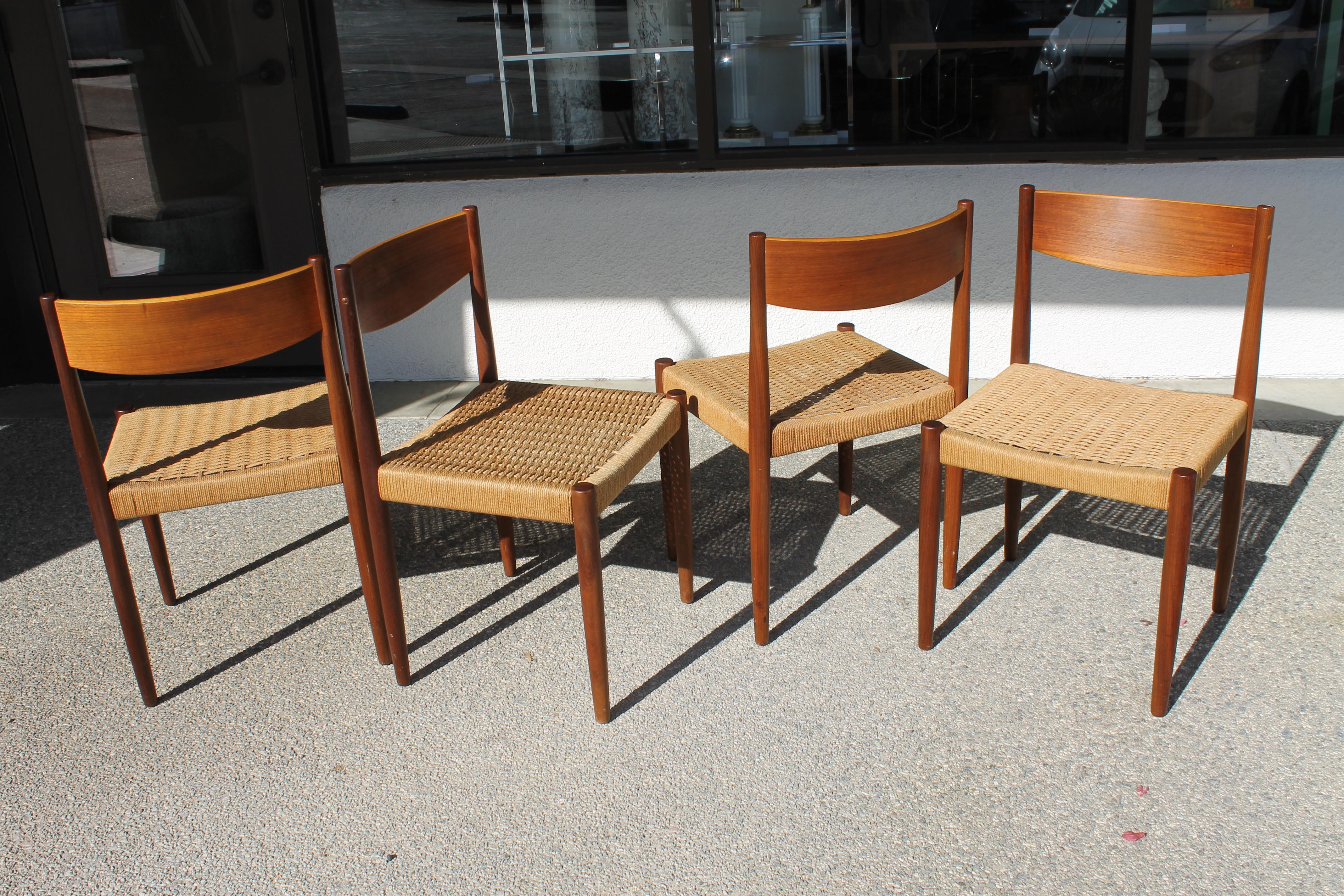 Four danish dining chairs possibly designed by Danish designer Niels Moller. Label says FurnitureMakers Danish Control. Each chair measures 18.5